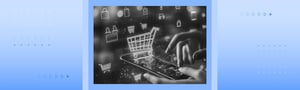 Hands using a smartphone with digital shopping cart and retail icons representing e‑commerce innovation