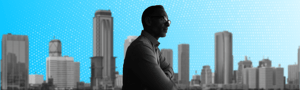 Silhouetted professional overlooking city skyline with dotted data pattern suggesting B2B insight.