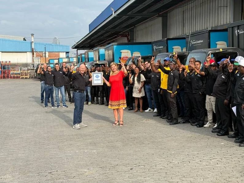 Dylan Piatti, Managing Director, and Lauren Filen, Customer Director, Africa, AGI, celebrate Norman Goodfellows as the #1 Liquor Distributor in the 2024 Voice of the Supplier in South Africa