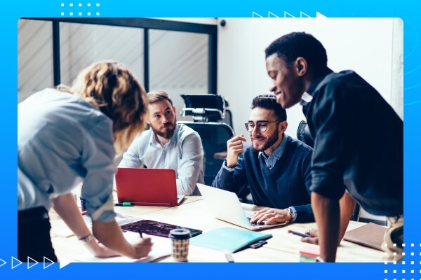 Business team during a planning session discussing ideas and next steps.