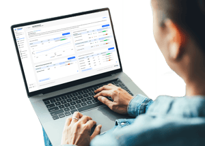 User reviewing LiveLens dashboard on a laptop with performance analytics, metrics, and actionable insights.