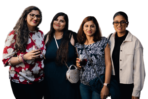 Our employees standing together at a company social event, representing team connection and workplace culture