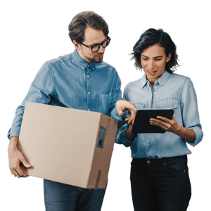 Logistics professionals coordinating package handling and inventory tracking using a tablet in a supply chain workflow