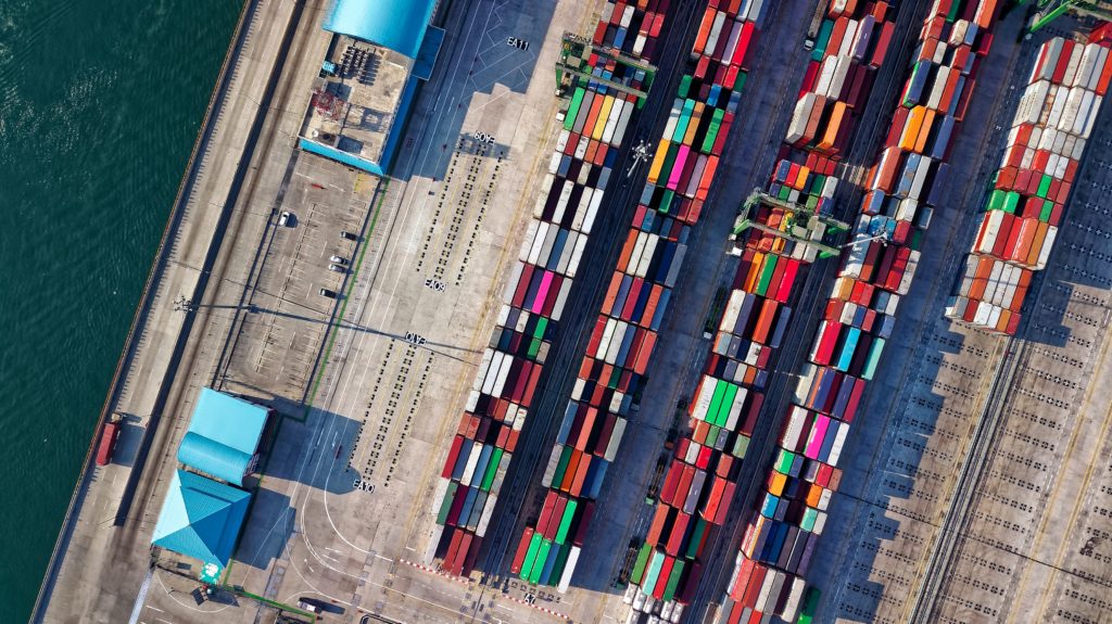 Aerial view of coloured shipping containers outside