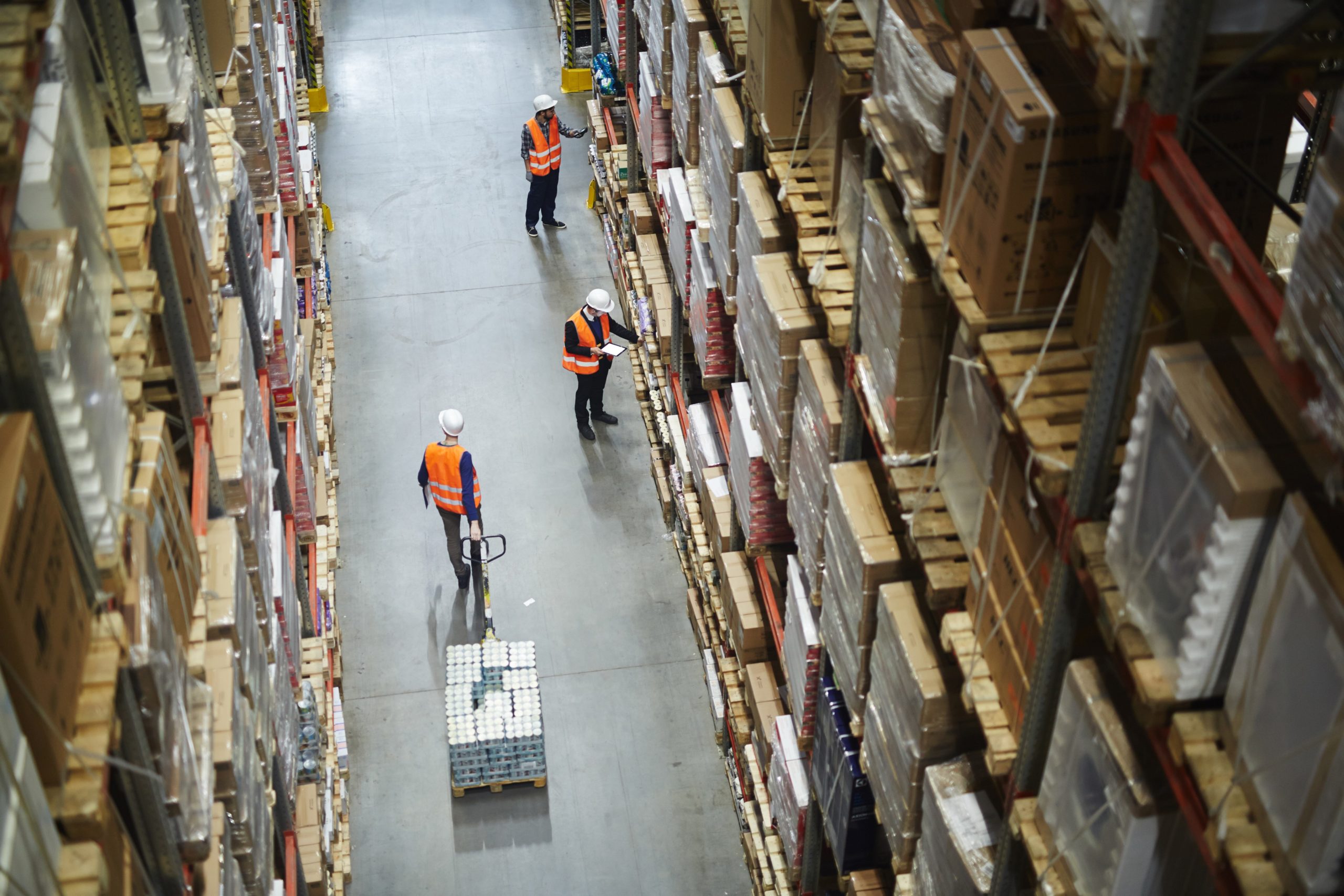 People working in a CPG warehouse