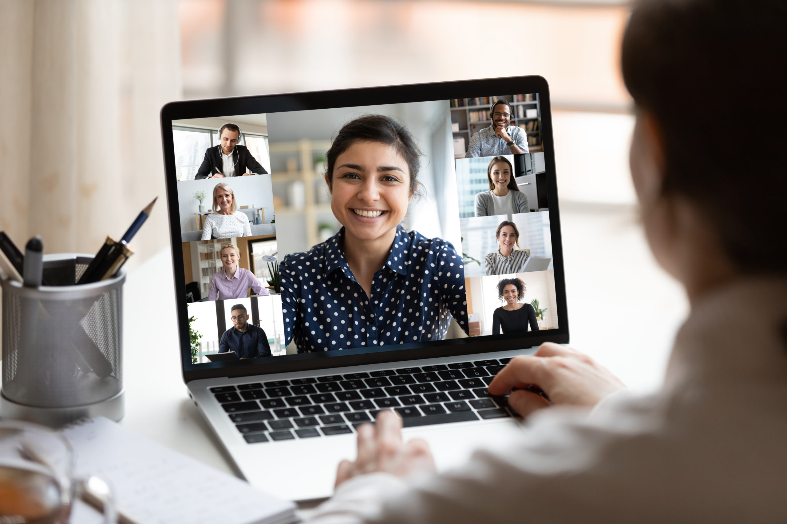 People connecting virtually via video conferencing