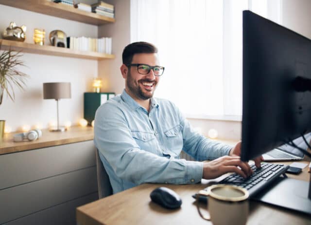 Male on the computer working remotely